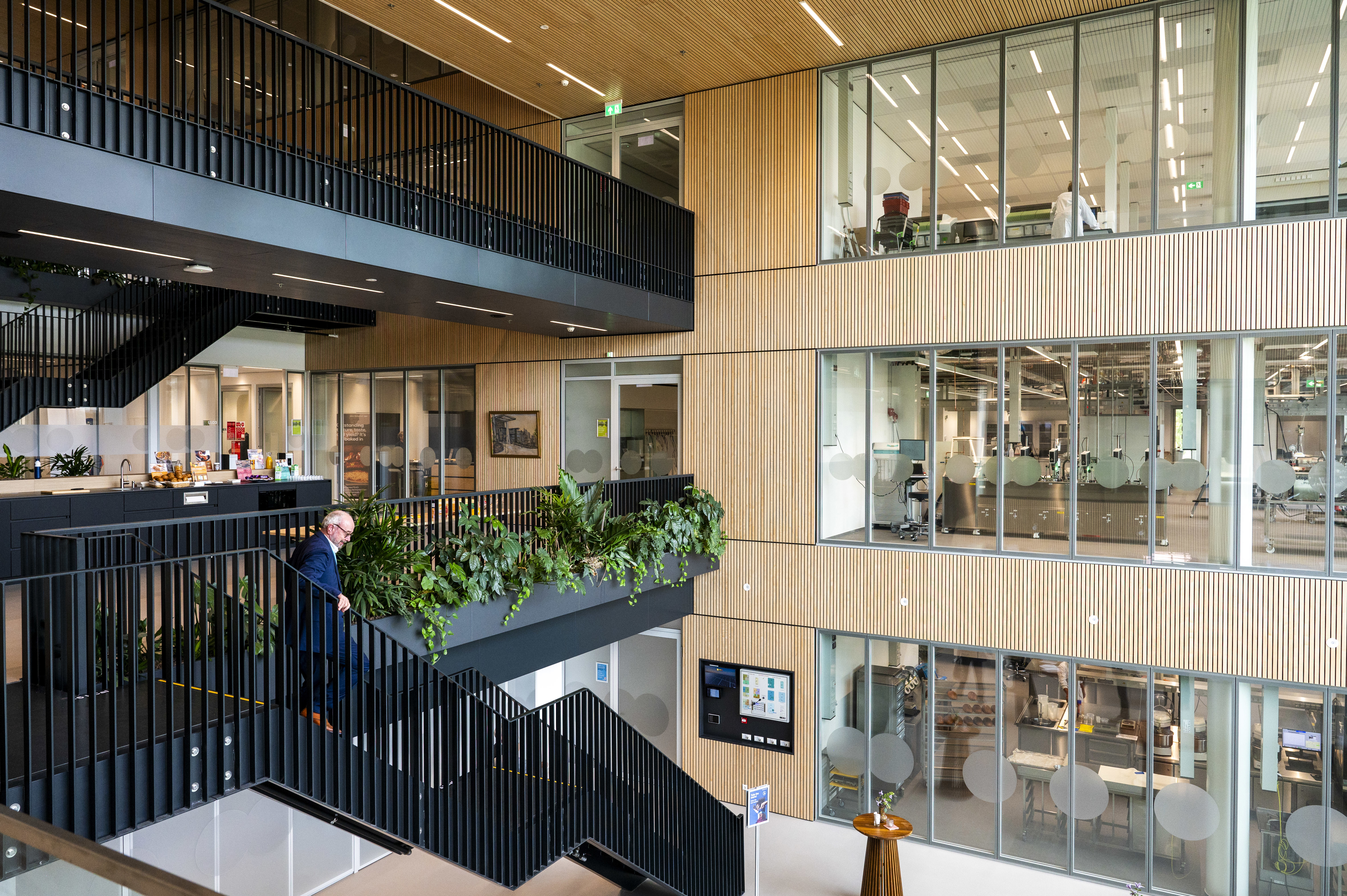 This slide displays Van Marken Food Innovation Center, Interieur, Fotograaf Sicco Van Grieken (1).
